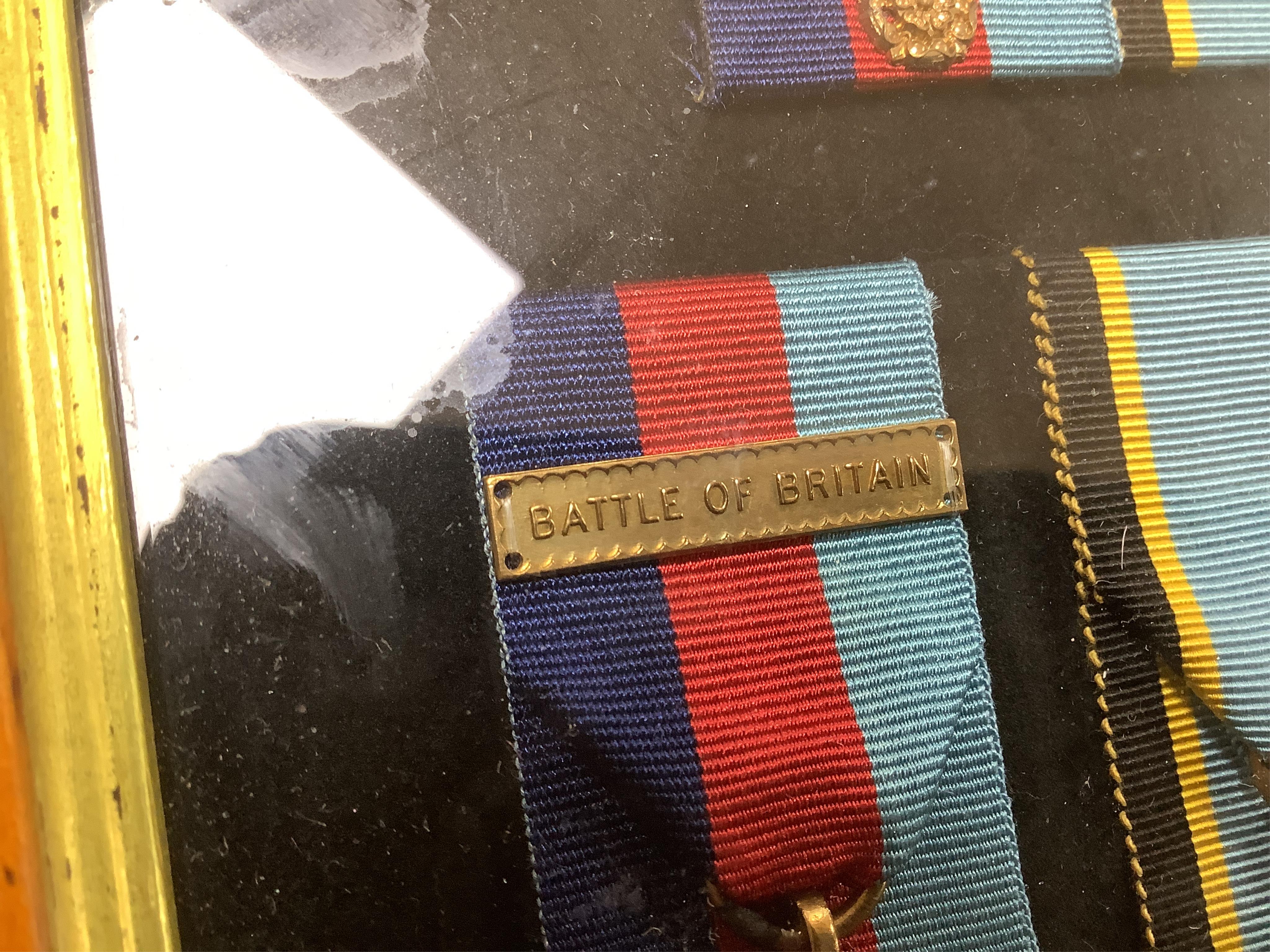 A framed WWII RAF medal group awarded to Wing Commander Brian Robert Noble, comprising;, The 1939-1945 Star, with clasp for the Battle of Britain, The Air Crew Europe Star, The Defence Medal, The British War Medal, The 1